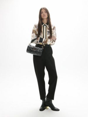 Pantalón fit con cinturilla a contraste LOLA CASADEMUNT